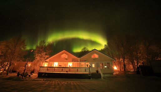 Nothern lights over Nuorgam Holiday Village in Finland